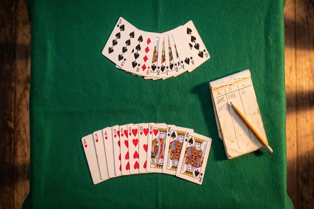 Poängräkning i gin rummy efter en knackning, med serier och poängprotokol